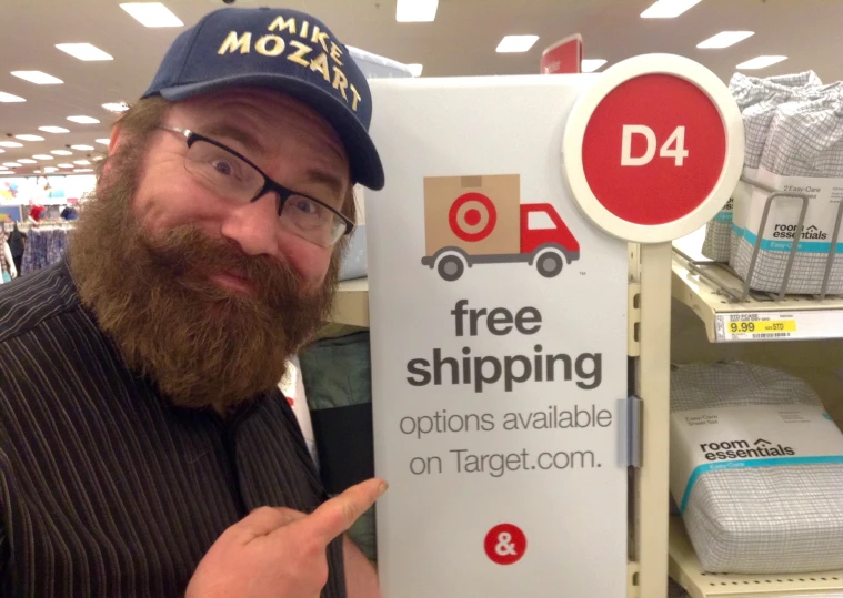 man showing sign for free shopping in a store