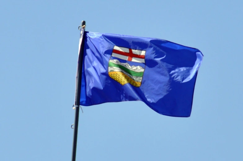 the large flag of iceland flies high in the sky