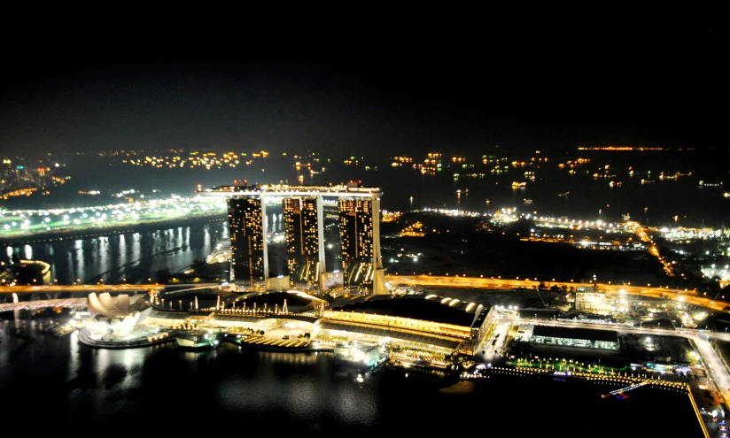 a very night view of an city and the river