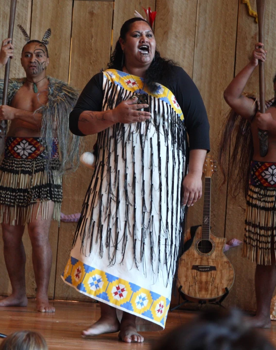 a woman in a native indian dance performance