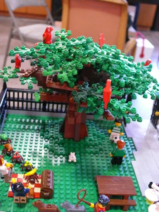the table has a lego model of a family tree