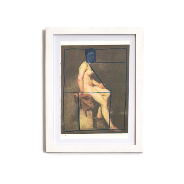 framed po in white wooden frame of sitting 