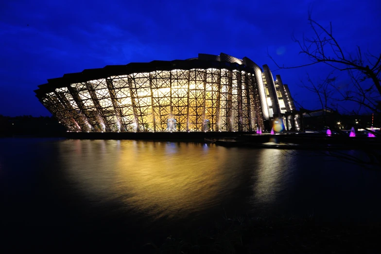 the building has many windows on it at night