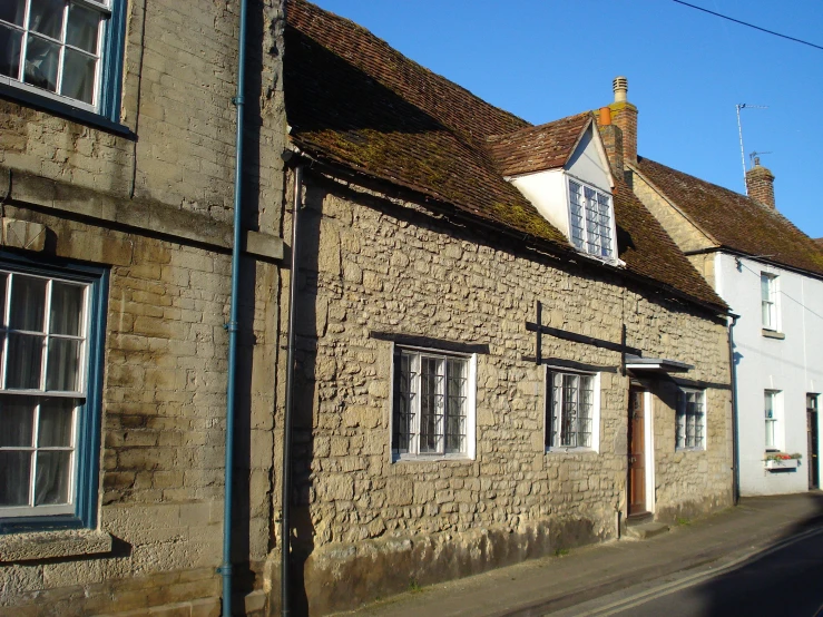 some very nice looking buildings on the side of a road