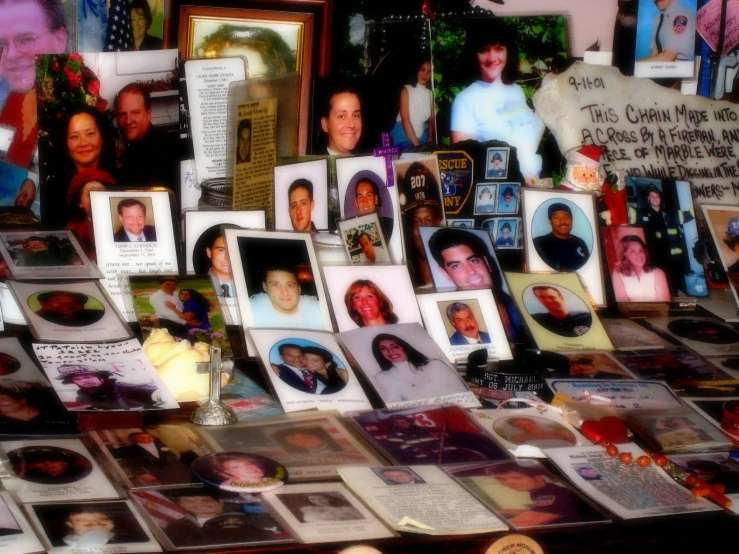 the family pictures are placed in front of the wall