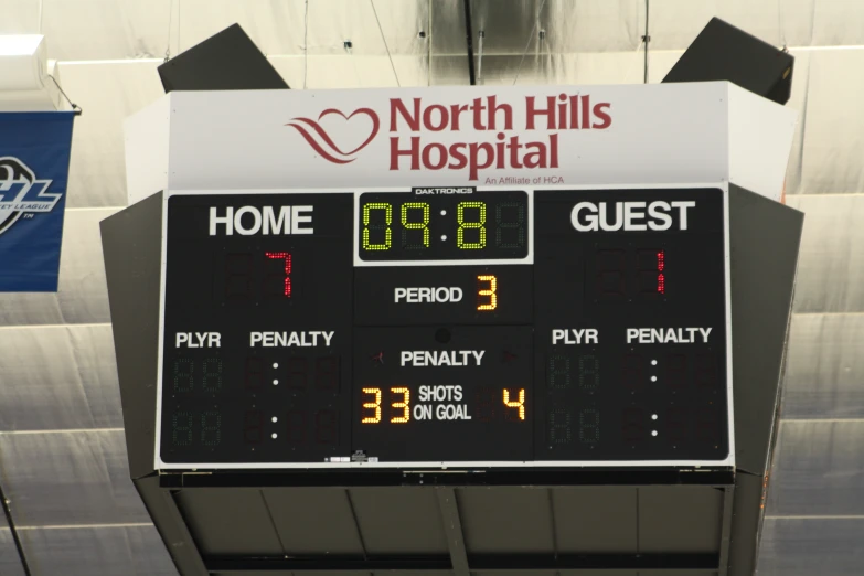 a large sign displaying the scoreboard for north hills hospital