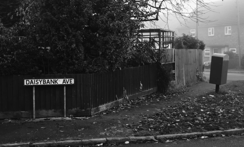 a sign near a gate saying a bank