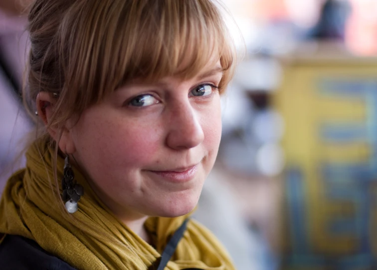 a woman is posing for the camera outside