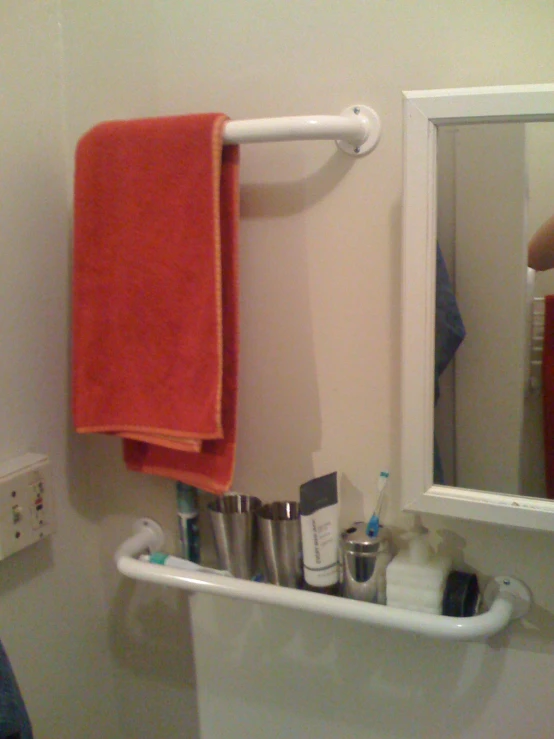 this is a bathroom with a towel rack