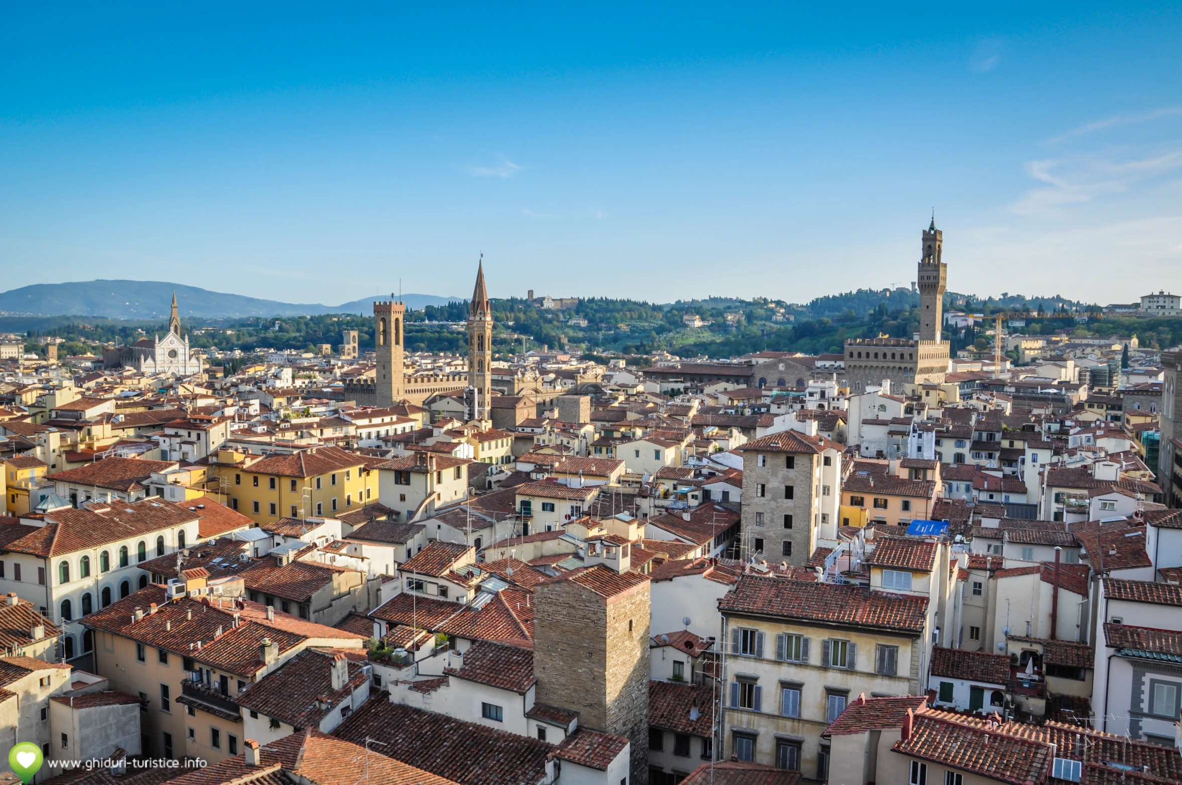 the view over the city is in a blue sky