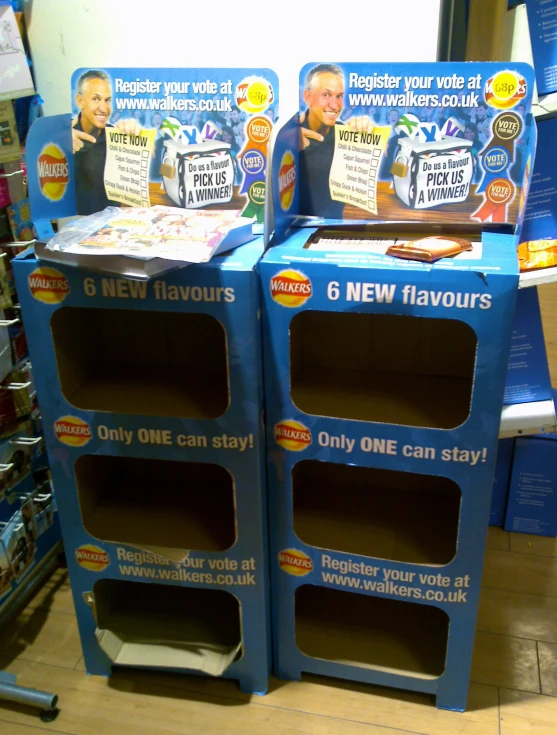 two cardboard boxes are displayed for sale