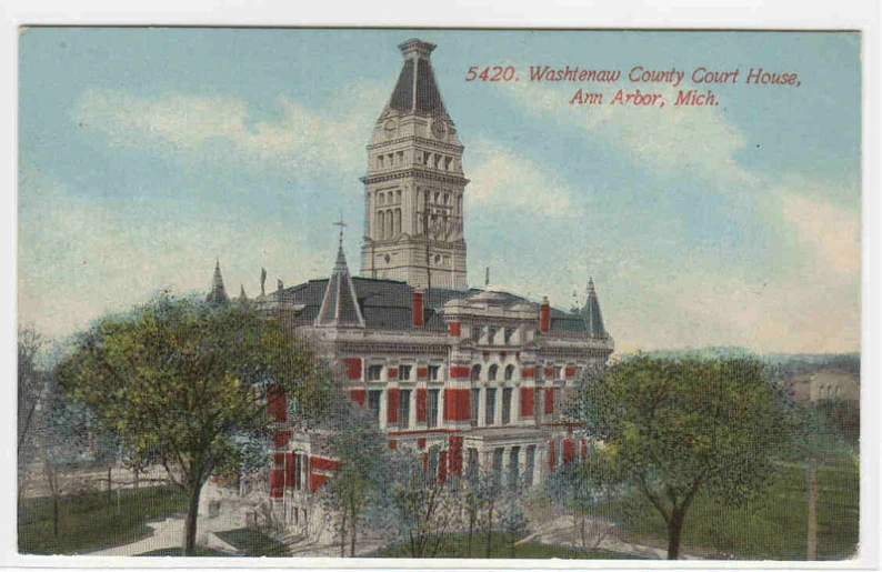 a large old building with a steeple on top