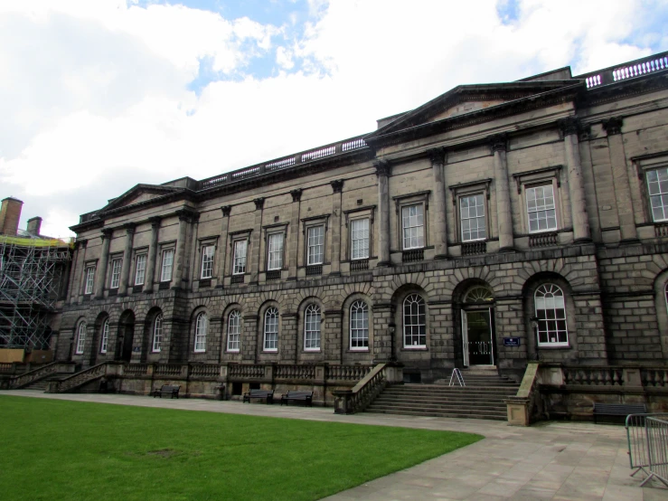 large building with two large porches and many windows