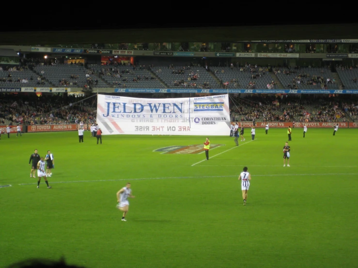 the fans and players of a soccer game