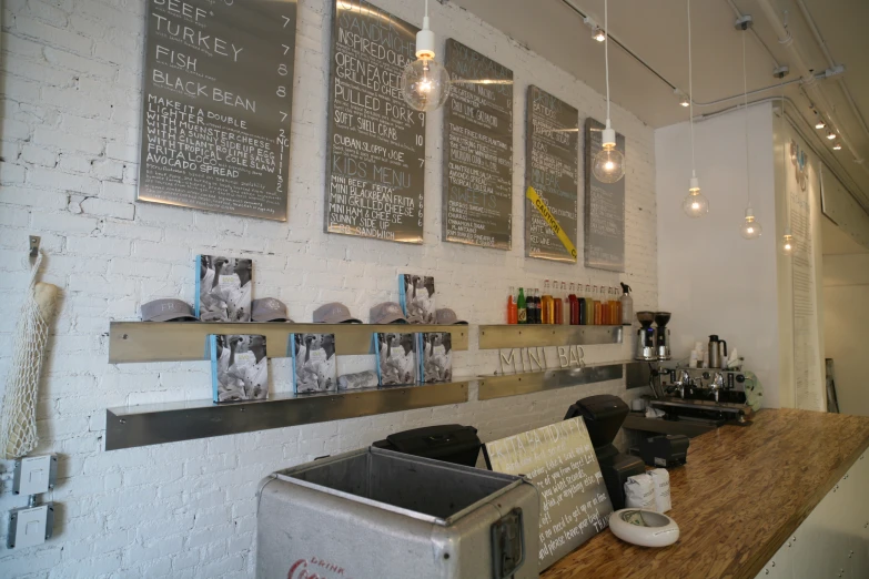 an empty counter in a restaurant with coffee cups