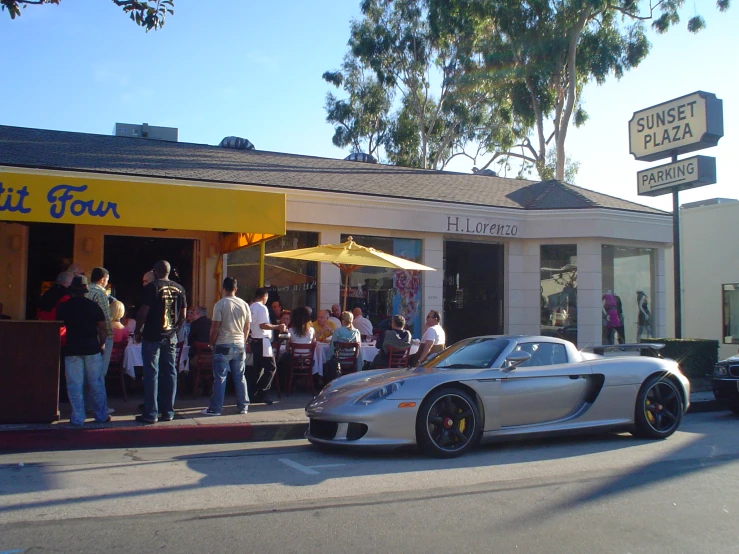 a small car that is sitting in the street