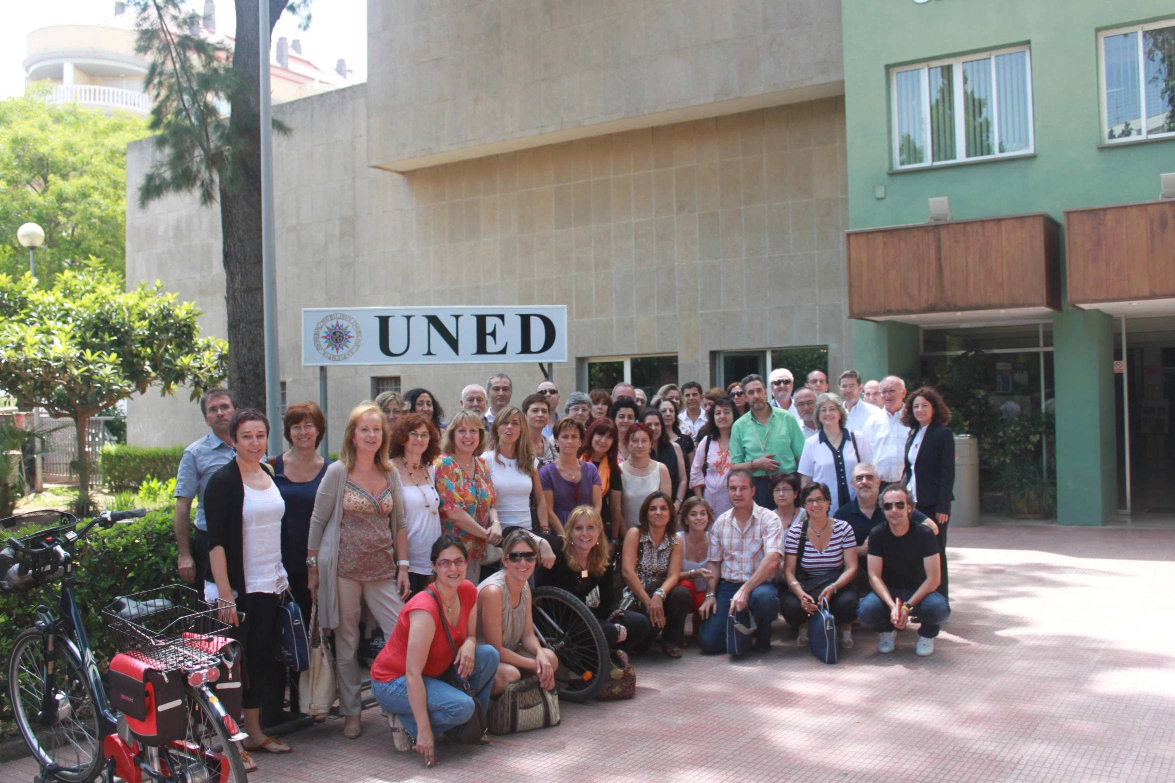 a group of people who are standing in front of a building