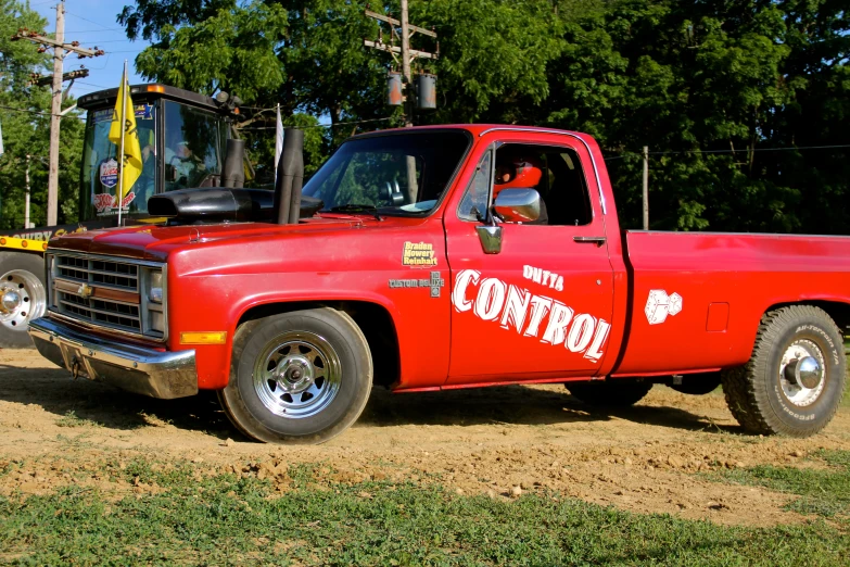 an old pickup truck parked in a field