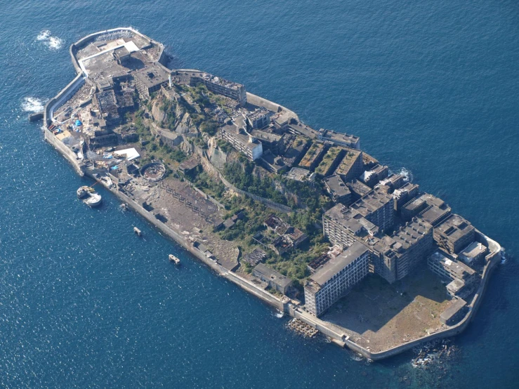 an aerial view of an island with buildings