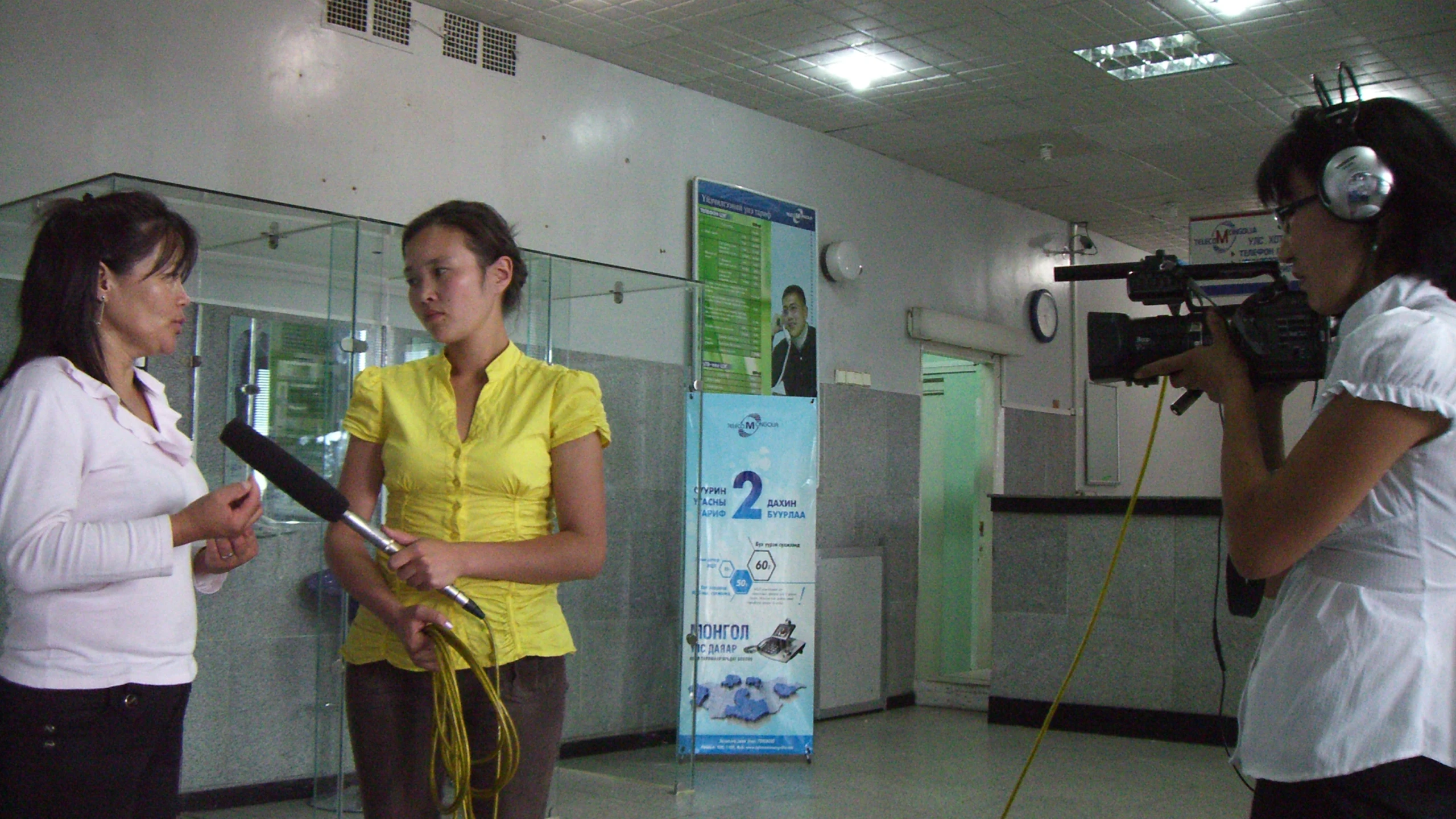 three women are holding some kind of equipment