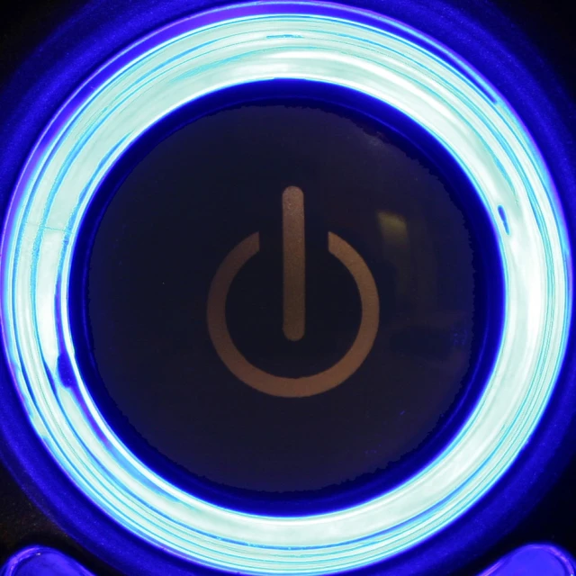 a turn to electric power symbol illuminated on dark surface