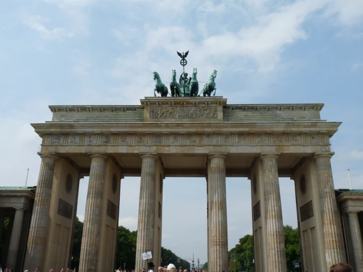 the monument looks like it has four statues on top