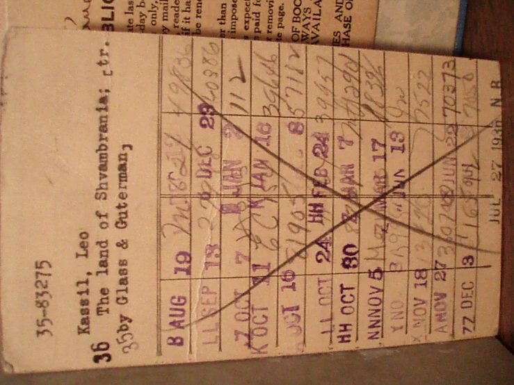 an old vintage score card with multiple numbers and lines