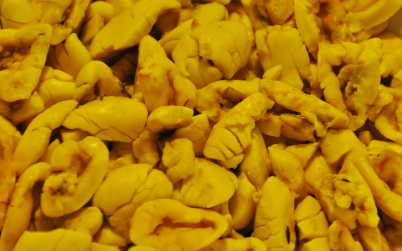 a closeup of a pile of cut up pieces of pasta