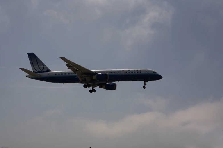 a large air plane flying in the sky