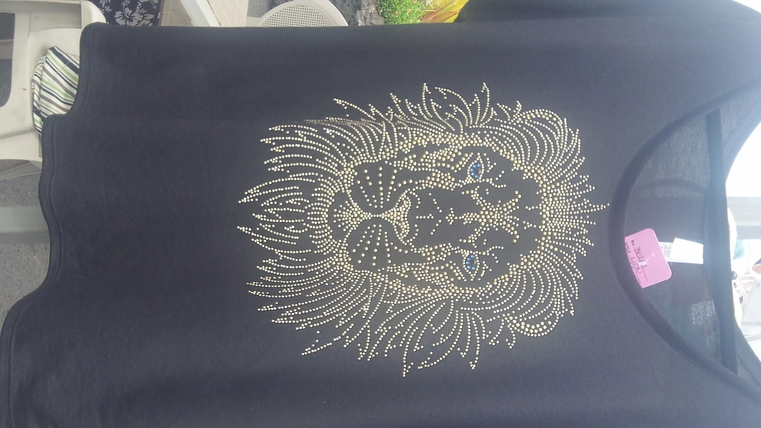 an animal tshirt is on display in the sun