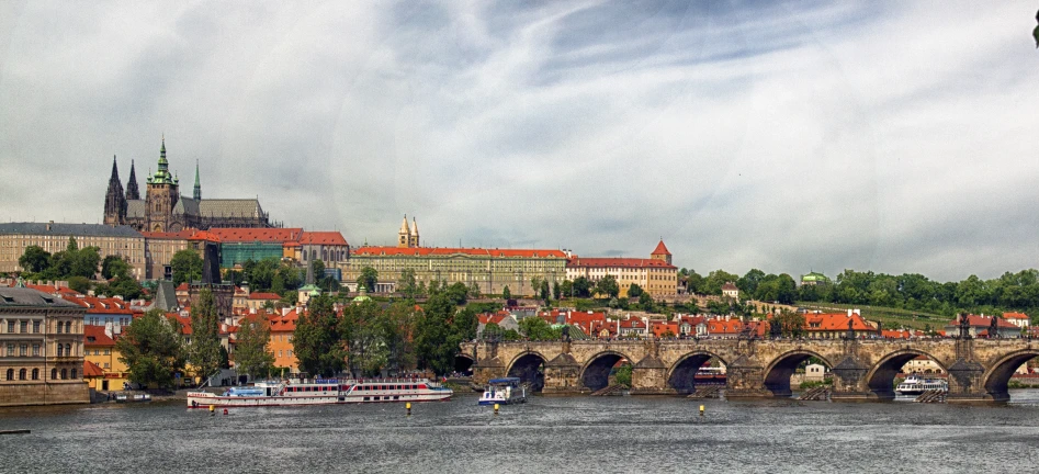 view of the city over the water with boats in it