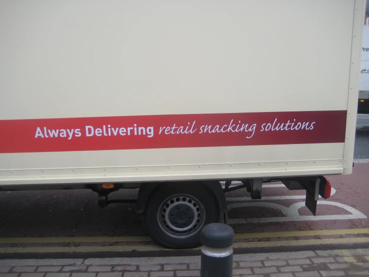 a truck is parked with its front end painted red