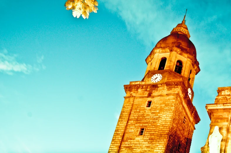 there is a clock tower built into the side of the building