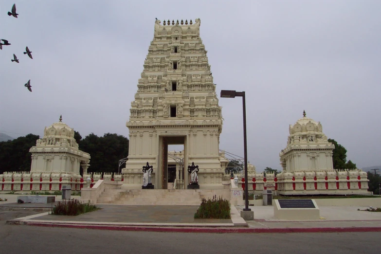 there is a statue at the entrance to this temple