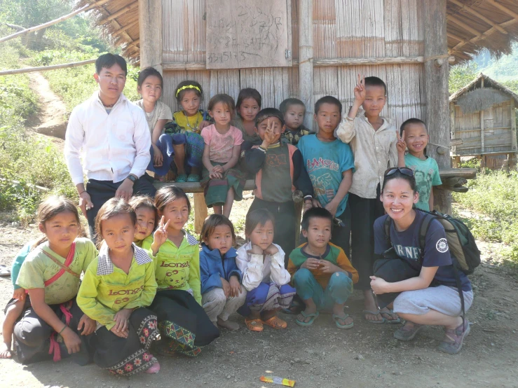 an image of some children with many teachers