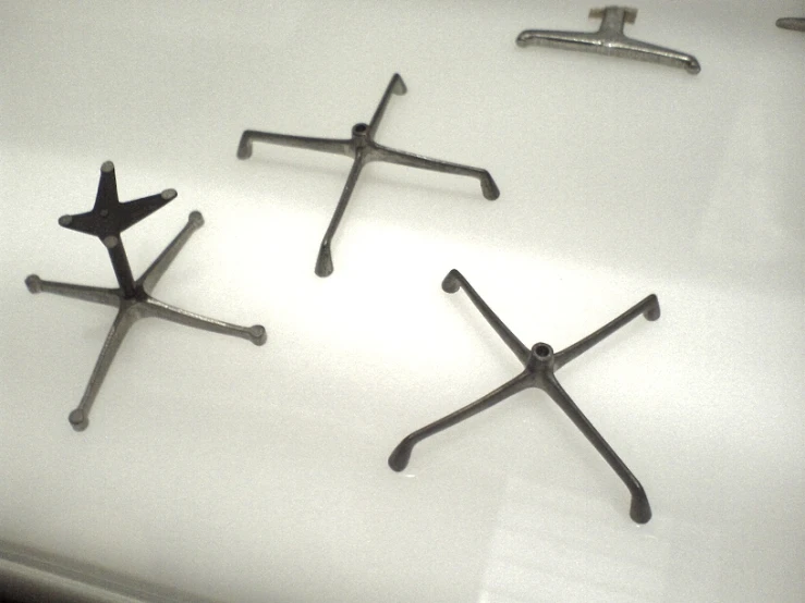 three crosses are on display with the middle one cross raised up