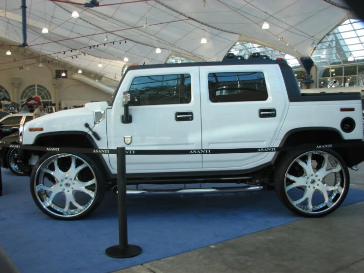 a hummer truck parked in an indoor area