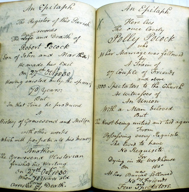 two old book open to show handwriting and other letters