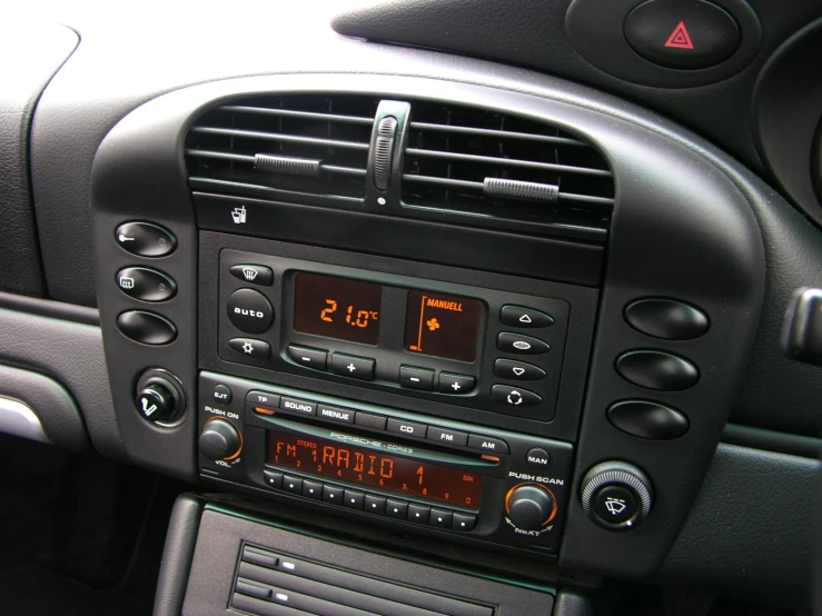 the interior of a car with the radio installed