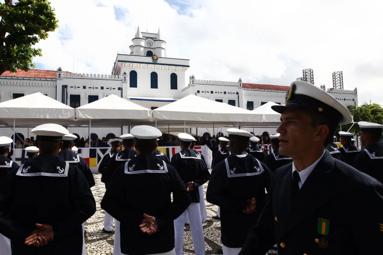 military parade taking place outside of the government building