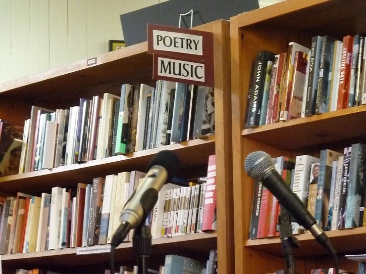there are several microphones that have books on the shelves