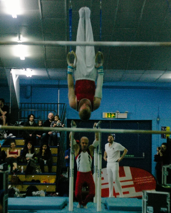 a person doing a stunt in front of an audience