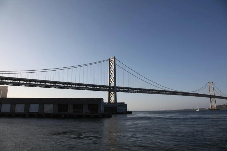 the sunshine is shining bright over the bridge