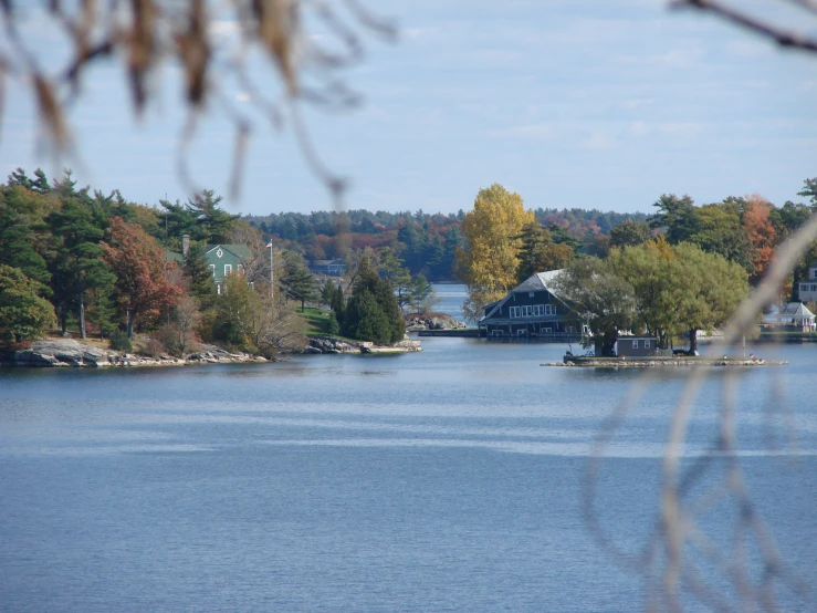 a lake and some houses on the other side