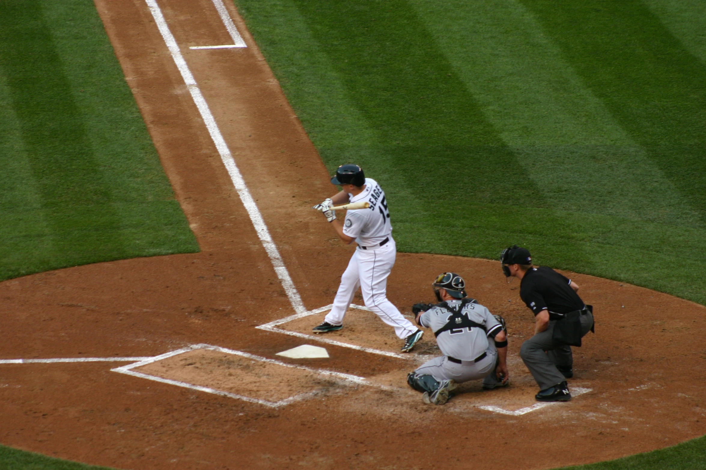 a baseball player getting ready to hit a ball