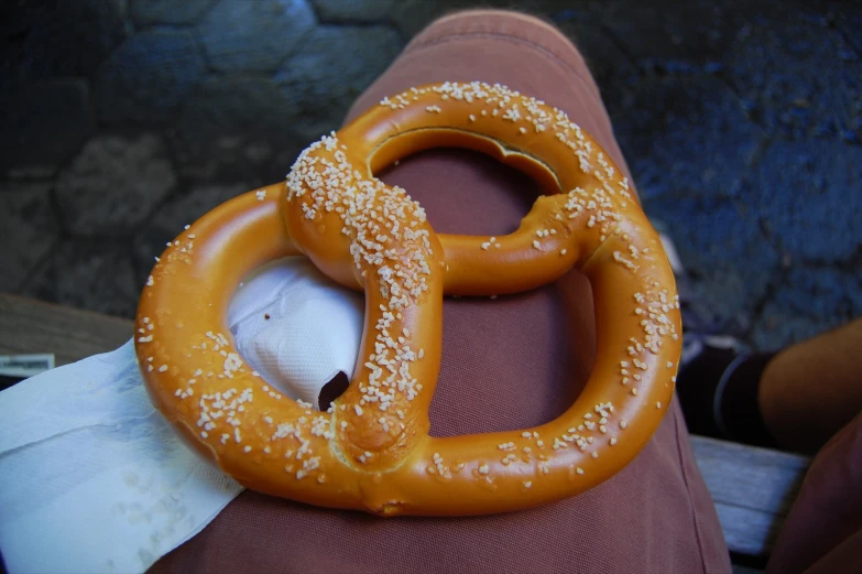 two large pretzels are sitting on a bag