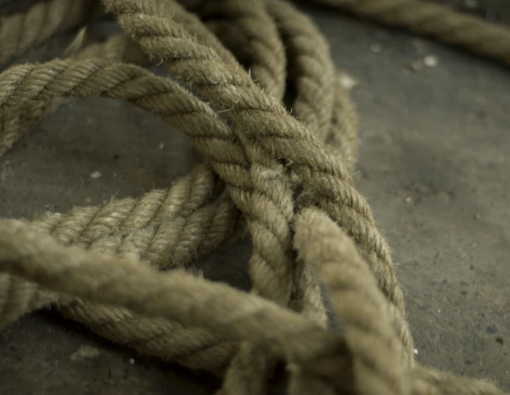closeup of a knot and rope on a floor