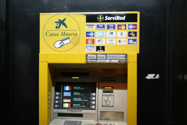 atm machine with cards and ons with window