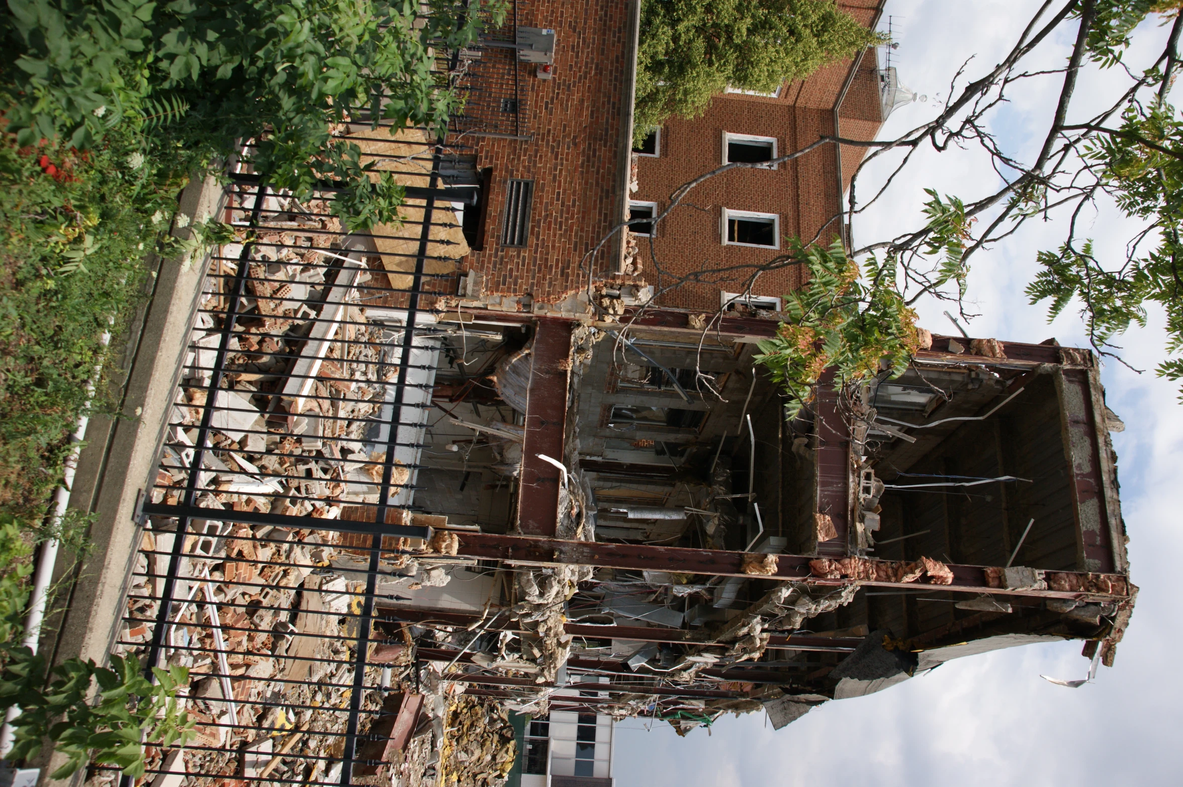 the demolished building has many debris around it