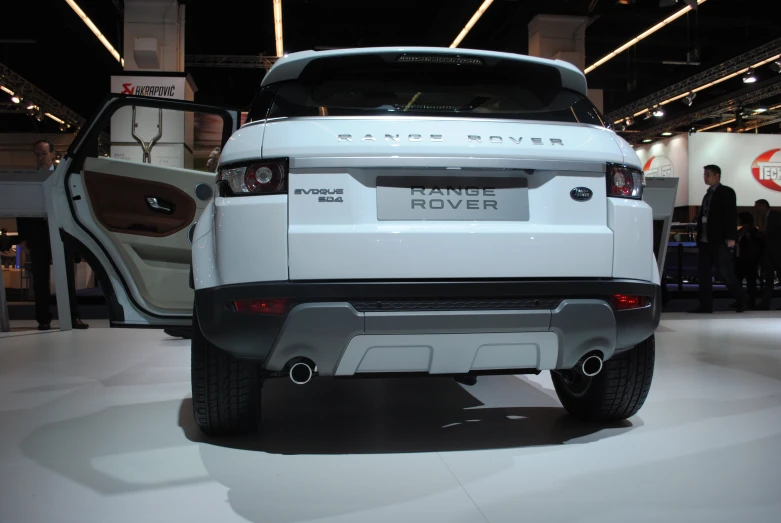 an all white range rover is on display at the show